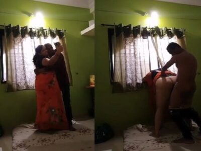 Chubby aunty and slim guy in standing doggy style action